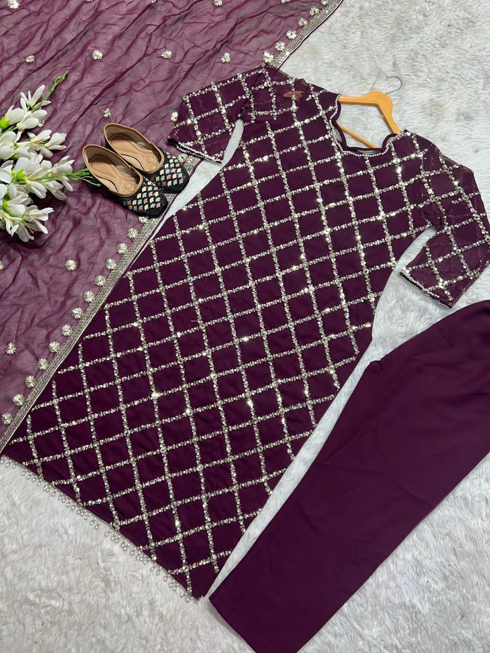 Designer sequence embroidered suite
