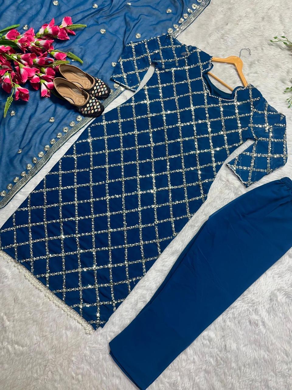 Designer sequence embroidered suite