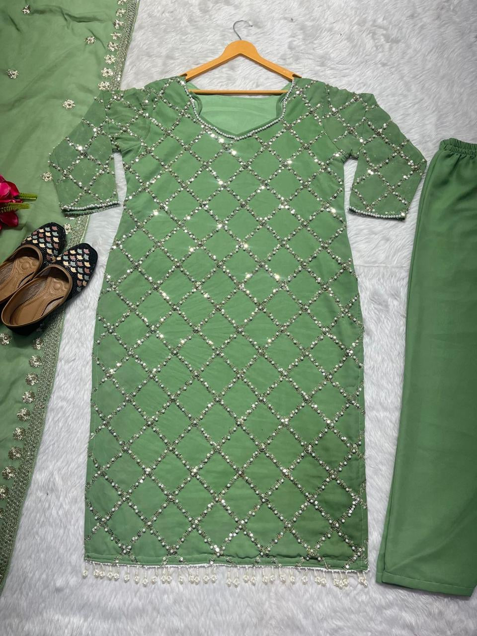 Designer sequence embroidered suite
