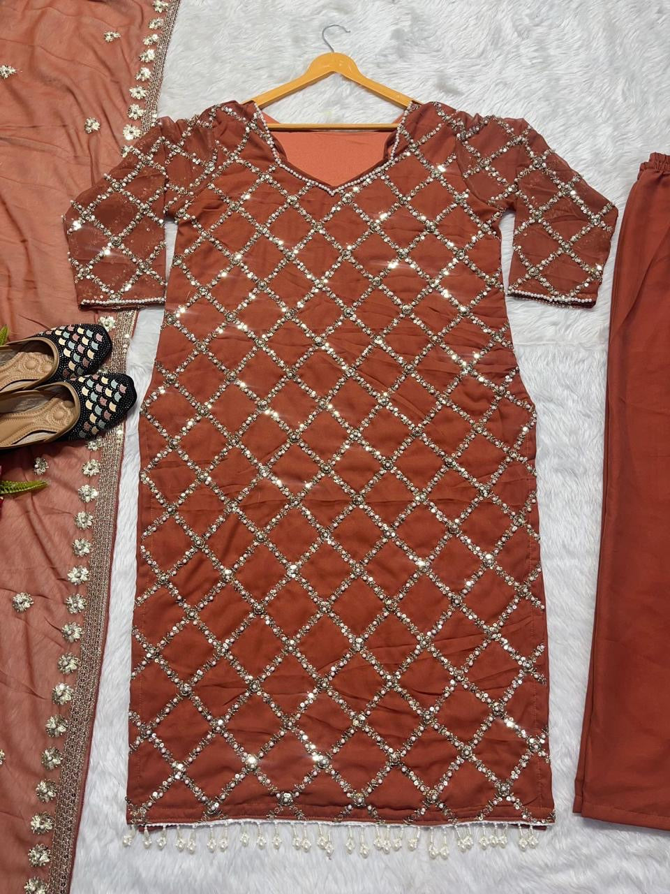 Designer sequence embroidered suite