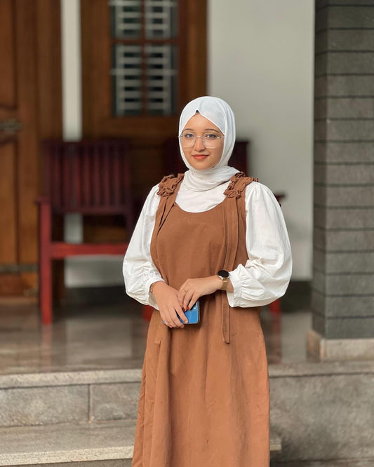 Modesty pinafore