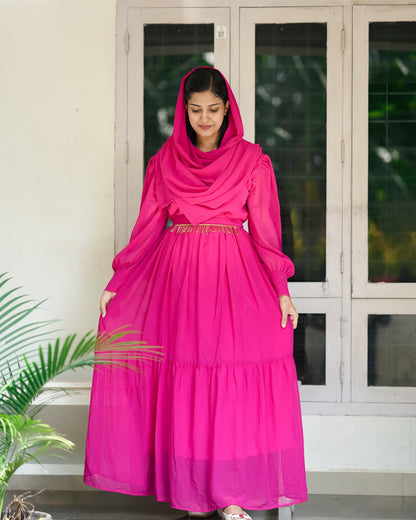 Gown with handworked belt