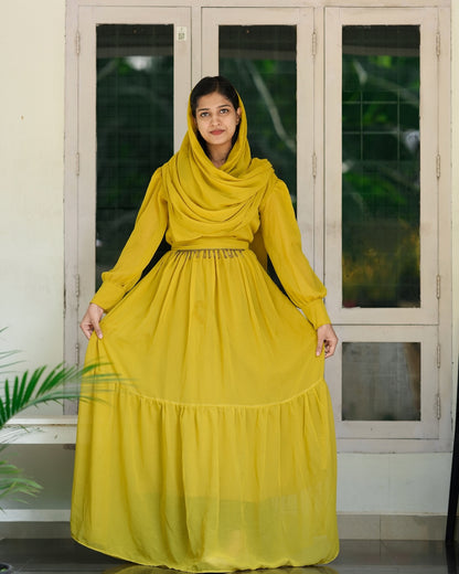 Gown with handworked belt