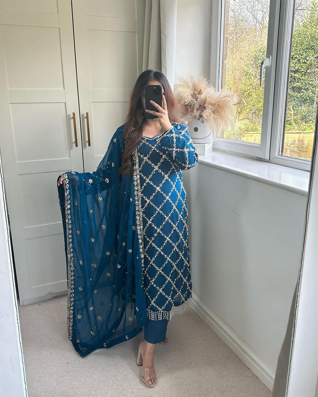 Designer sequence embroidered suite