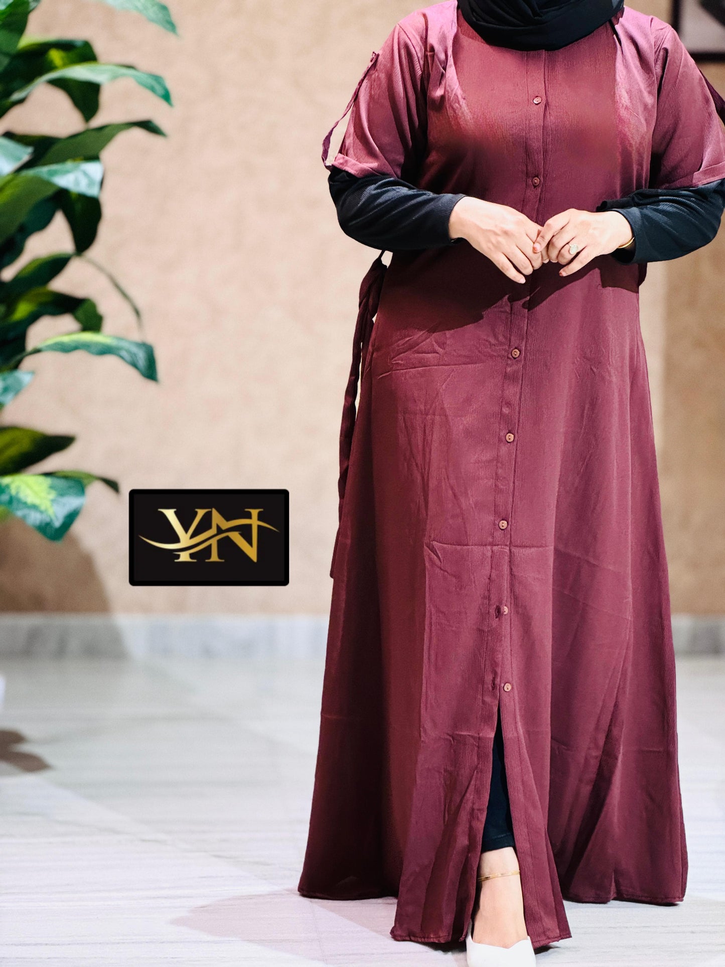 Imported attached sleeve top