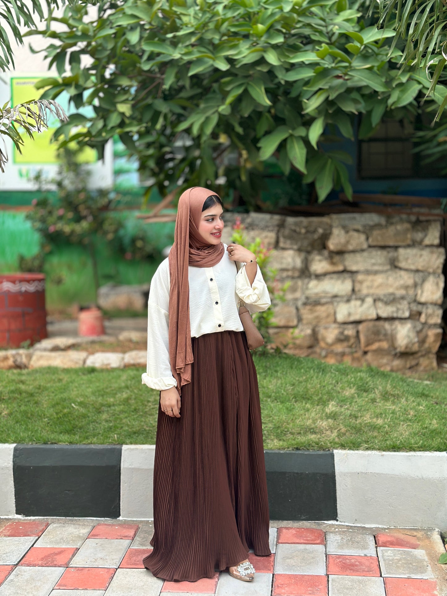 Pleated skirt and cey top